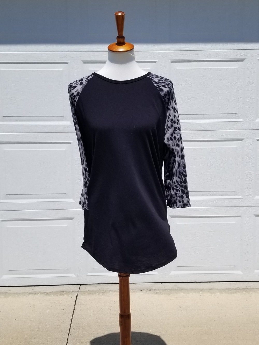 LuLaRoe Black Raglan Top with Gray Leopard Sleeves